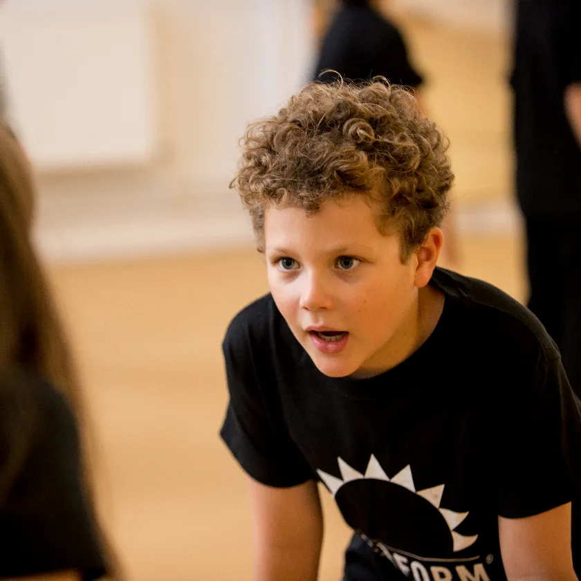 Child acting in drama class